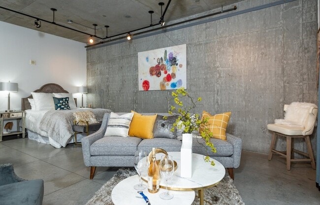 Building Photo - Rare Availability in the Streetcar Lofts, Parking, and Some Utilities Included