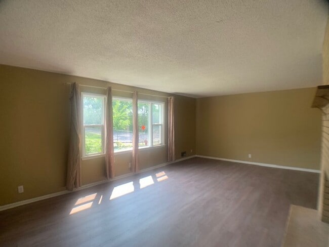 Building Photo - Huge yard! Updated appliances and more!