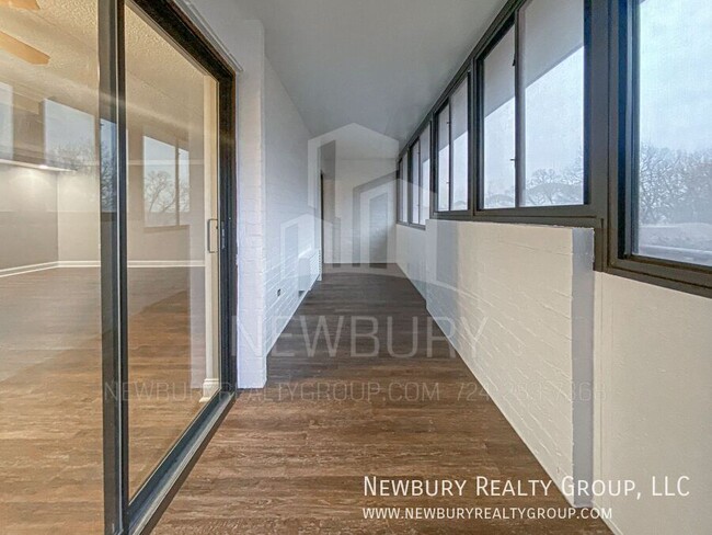 Building Photo - Luxury 1-Bedroom Penthouse with Modern Ren...