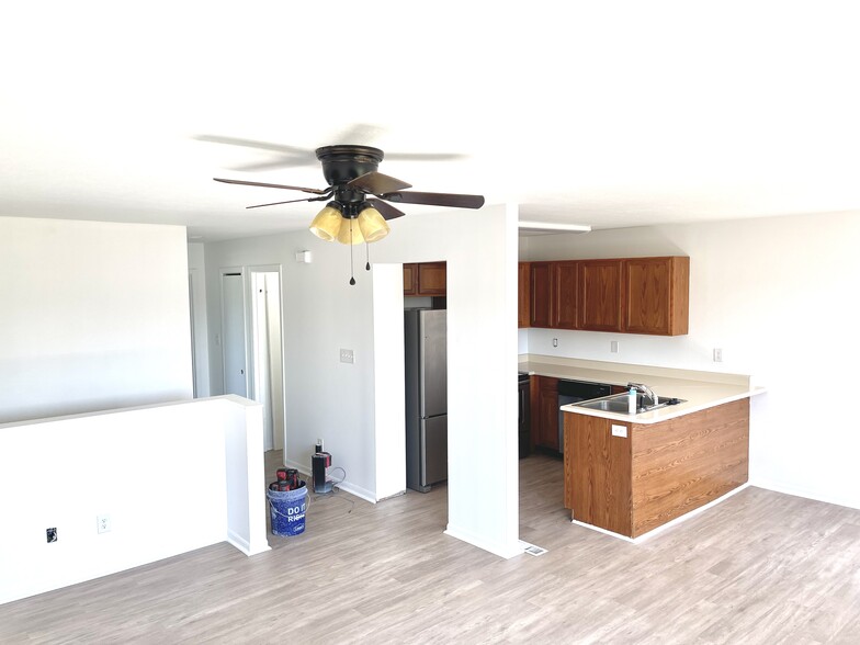 View from upstairs living room into kitchen with dining nook to the right - 1921 Acorn Road