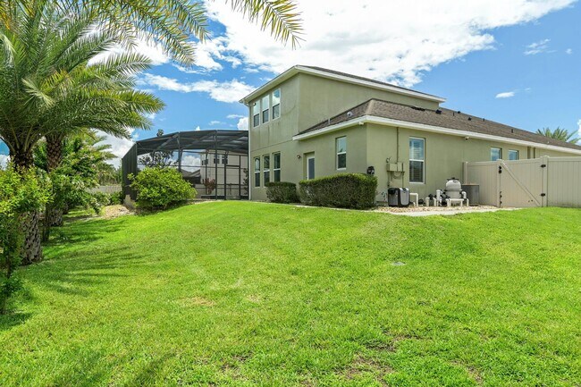 Building Photo - Expansive 4 bedroom, 3 bath remodeled home in gated community