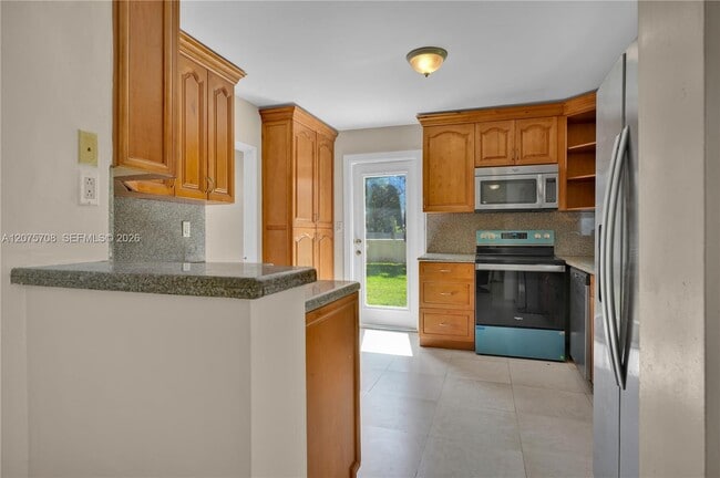 Building Photo - 8775 SW 53rd Ct
