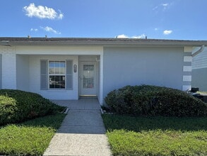 Building Photo - "Charming 2-Bed, 2-Bath Oasis in New Port Richey – Your Ideal Retreat Awaits!"