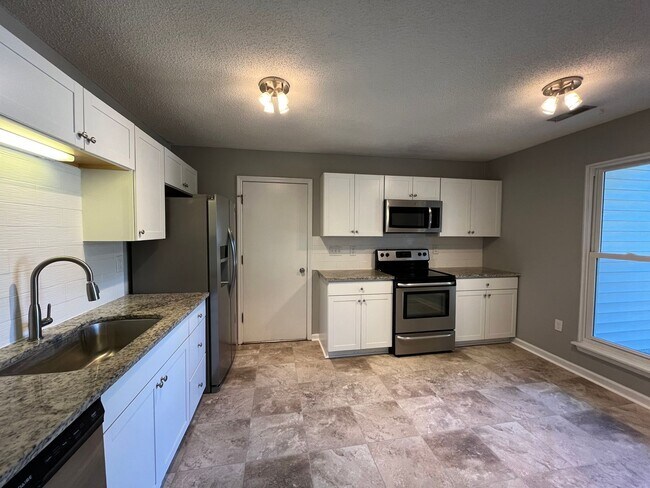 Building Photo - Charming Renovated 4 Bedroom Home