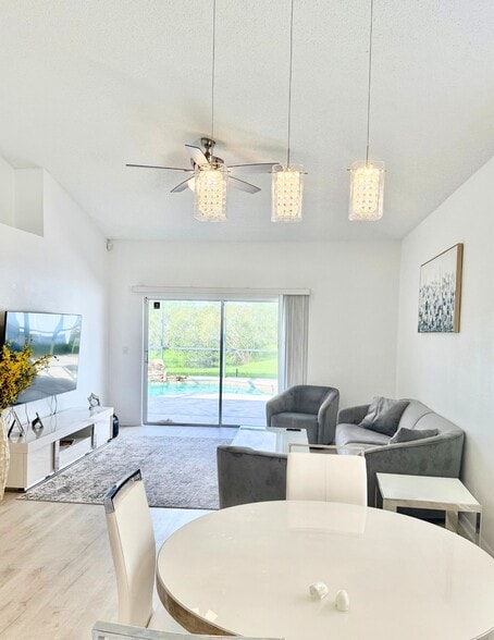 Family Room and Dining Area Looking Out Over Pool & Pond - 2414 Siward Ave