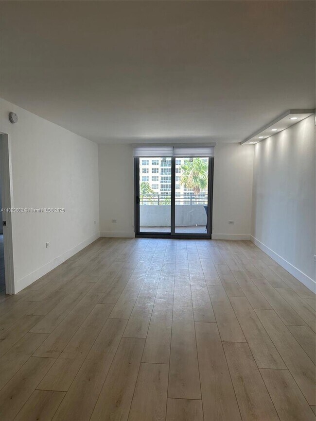 Building Photo - 5555 Collins Ave