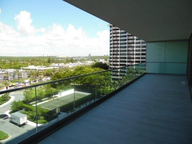 Building Photo - 10201 Collins Ave