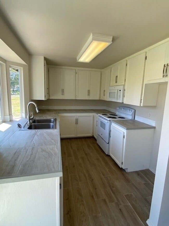 Building Photo - Non-Refundable & Security Deposit Total: $...