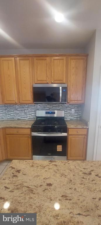 Building Photo - 10210 Sherman Heights Pl