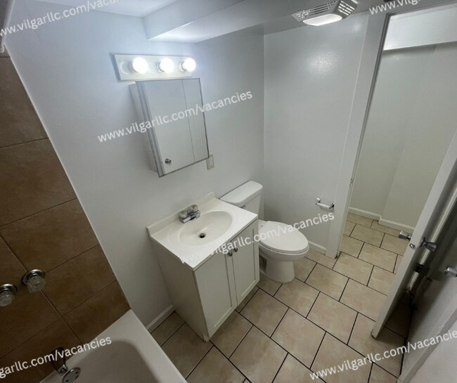 Building Photo - 1677 W 14th Ave