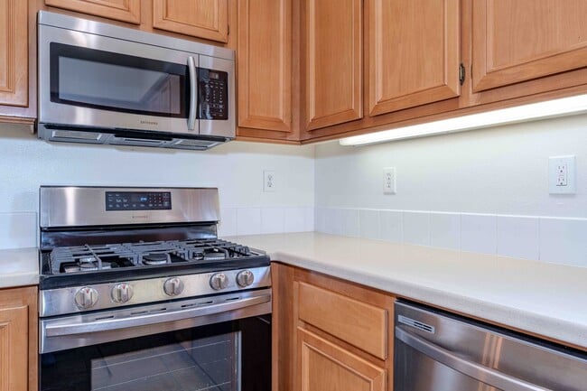 Building Photo - Stunning Upgraded Tri-Level Condo in South Coast Metro’s Exclusive Vantage Community