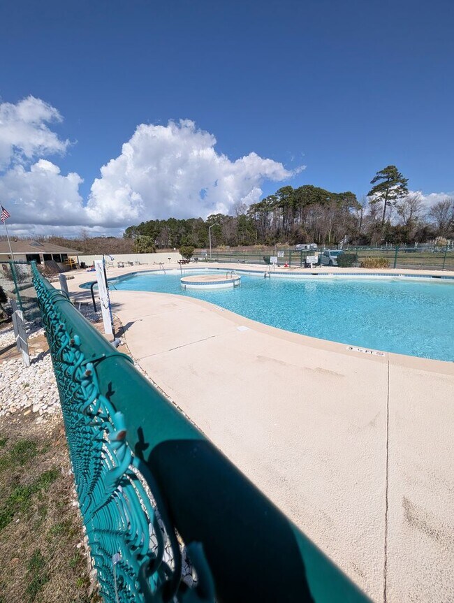 Building Photo - Dreamy Little River Condo — Furnished, Elevator Access, Pool & Marina Nearby!