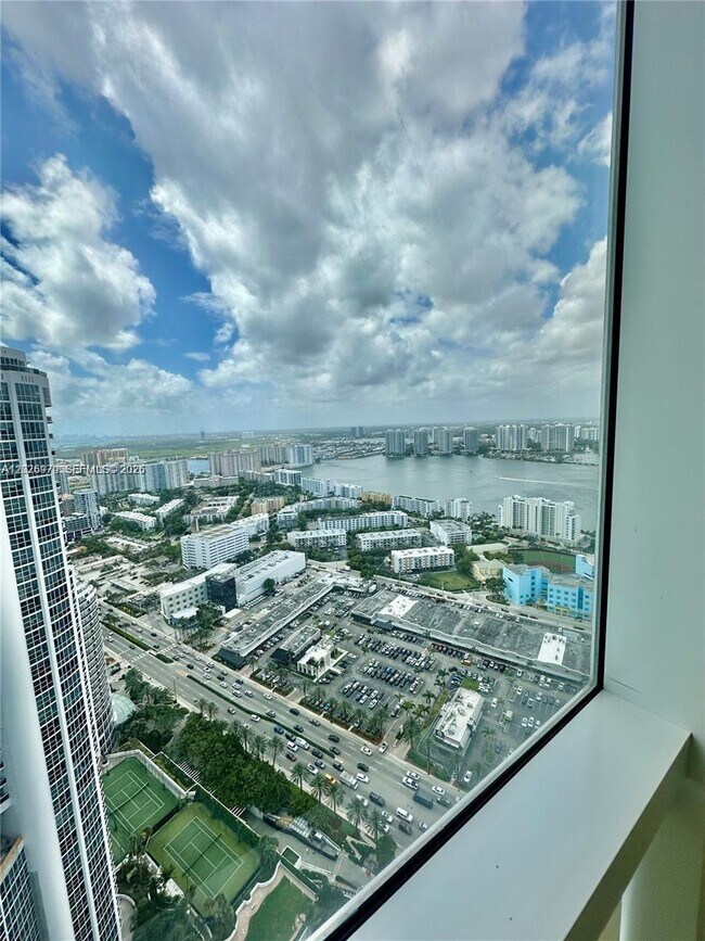 Building Photo - 18201 Collins Ave