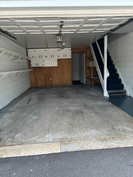 Garage with laundry/storage room in the back - 43 State St