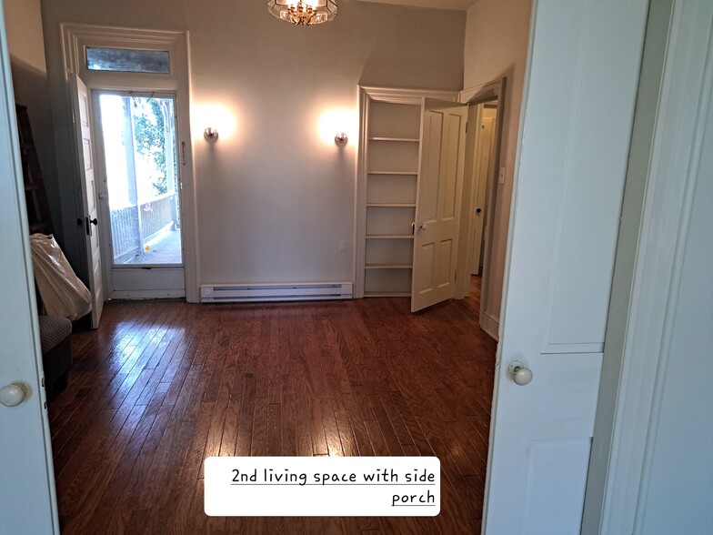 (Second) main living space with adjacent side porch - pocket doors work! - 224 N Potomac St