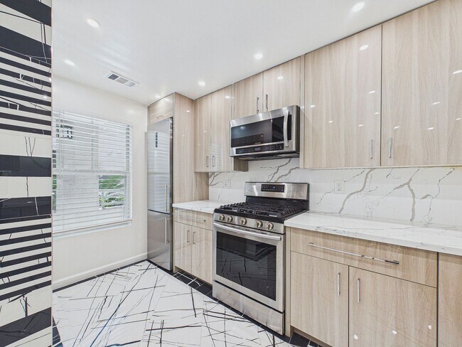 Building Photo - Stylish & Updated 1BD/1BA Condo in Secure Caldecott Community – Parking + In-Unit Laundry