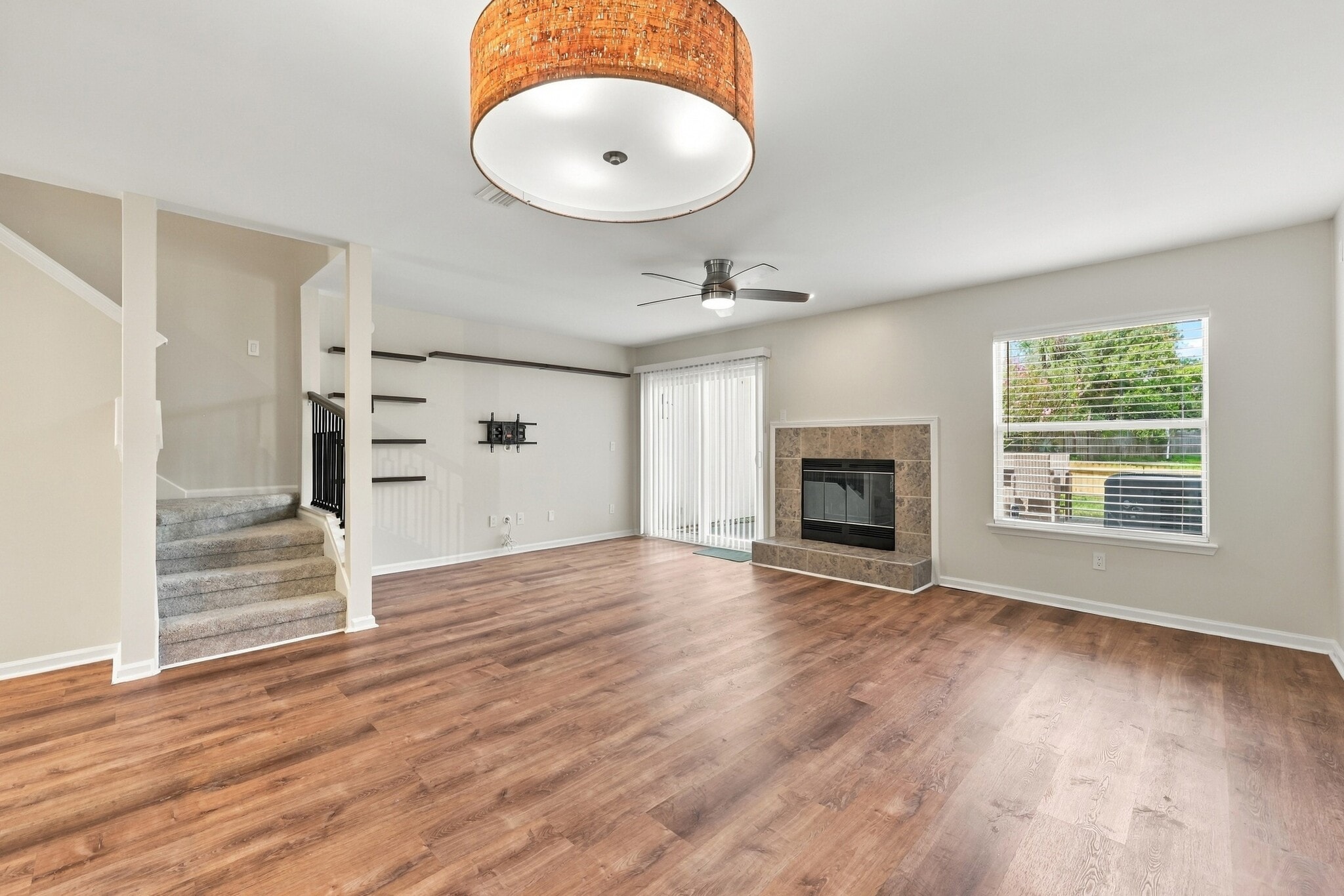 Open concept with display shelves and TV mount. - 3622 Caroline Vale Blvd