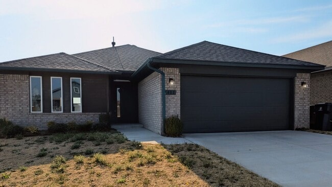 Building Photo - Spacious Yukon Home with Storm Shelter, 2-Car Garage & Fenced Yard!