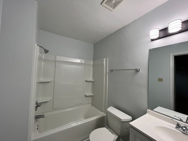Building Photo - Three-bedroom, two-and-a-half bathrooms in...