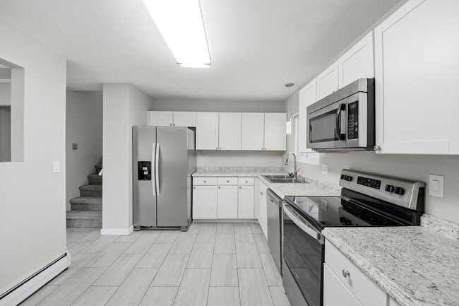 Building Photo - Updated 4BR Home with 2-Car Garage in Stratmoor