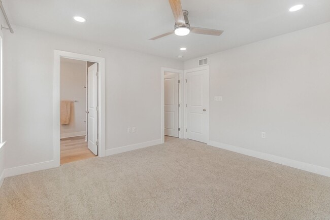 Building Photo - Modern 2025 Townhome | Open-Concept Living, Chef’s Kitchen with Large Island & 2-Car Garage