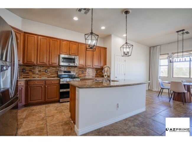 Building Photo - Resort-Style Living in Estrella Mountain Ranch - Private Pool, Solar &amp; Privacy