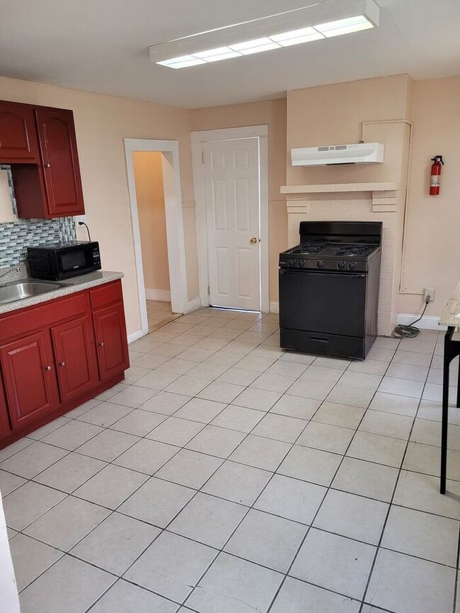 Building Photo - Three-Bedroom Apartment Near Public Transportation