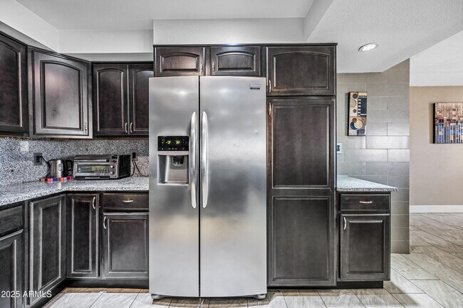 Building Photo - 7940 E Camelback Rd