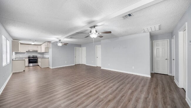 Building Photo - Rural, wooded living in this 4 bedroom, 2 full bath home on just under a quarter of an acre. NEW ...