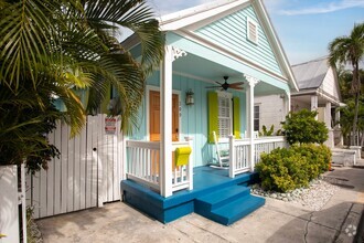 Building Photo - Key West Charm Meets Modern Elegance: Ench...