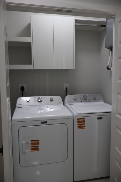 laundry with shelving - 1005 Hidden Hills St