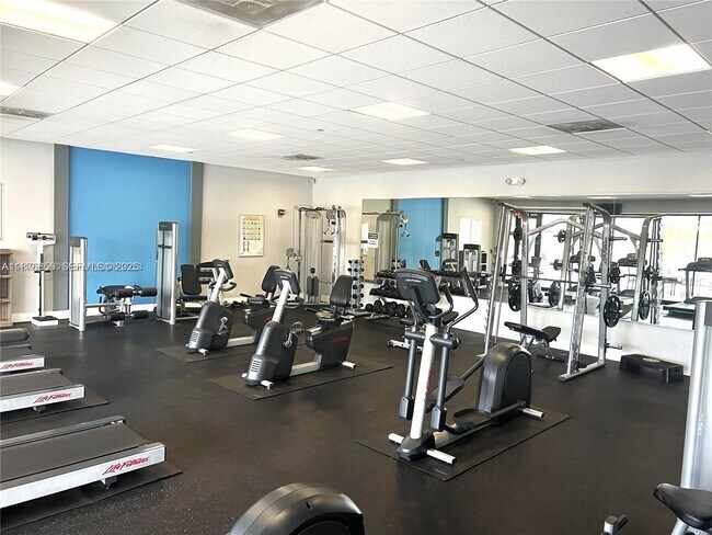 Building Photo - 3675 N Country Club Dr