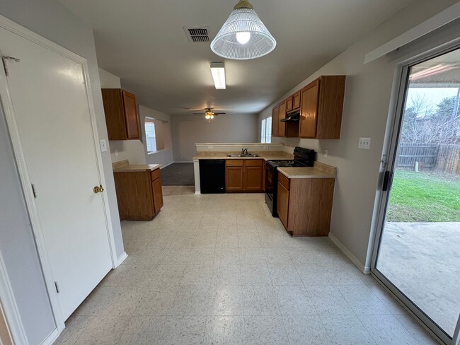 Building Photo - SPACIOUS 4 BR ON A CUL-DE-SAC W/ 2 LIVING AREAS & 2 EATING AREAS*STORAGE SHED*COVERED PATIO*EASY ...