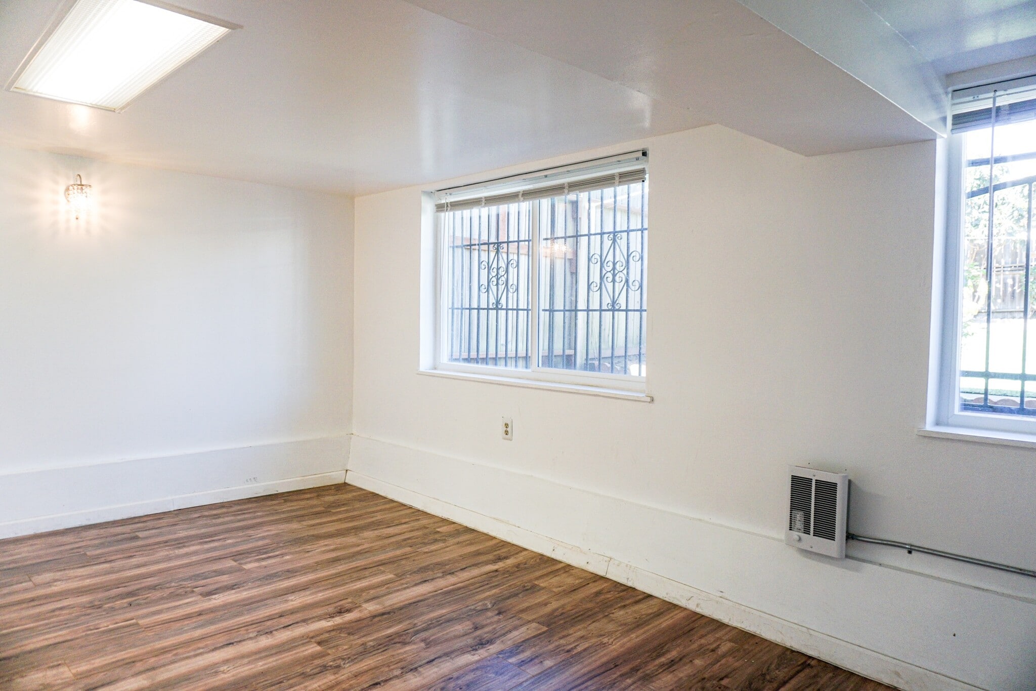 Bedroom with tons of natural lights and brand new windows. Fits King size bed - 38 San Gabriel Ave