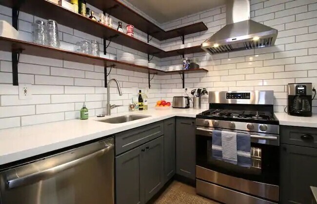 Building Photo - Stunning Duplex with Wrap Around Deck - Available Now