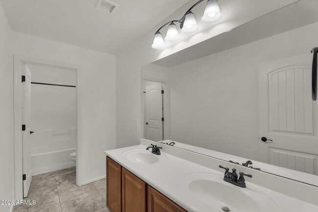 Building Photo - 12217 W Planada Ln