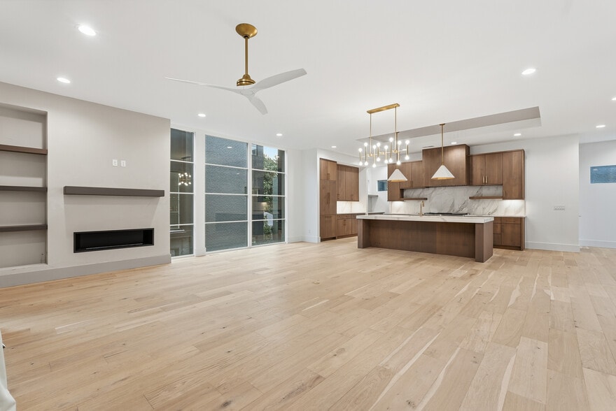 Expansive open concept living space with floor to ceiling windows and seamless flow into the kitchen - 3718 West End Ave
