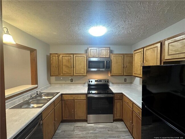 Building Photo - 1202 Huntsman Ct