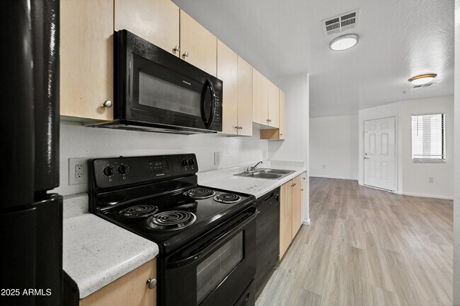 Building Photo - 3065 N 67th Ave