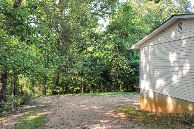Building Photo - Single level living, backs to trees