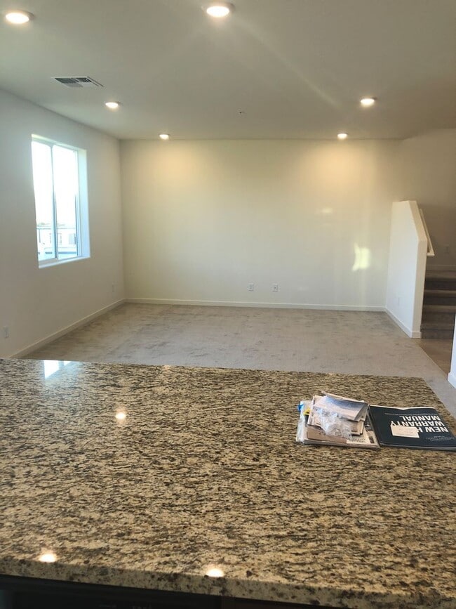 Building Photo - CORNER LOT - END UNIT - NO YARD TO MAINTAIN - GRANITE - STAINLESS - GATED