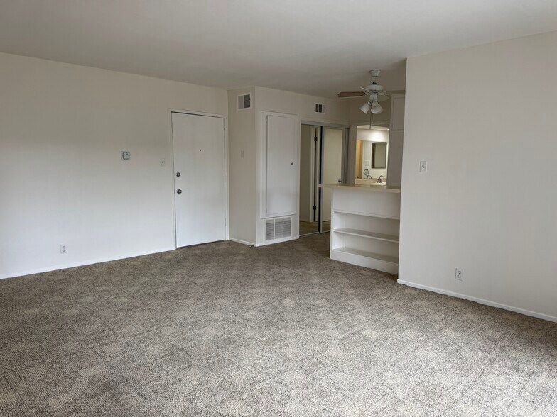 Living Room looking toward front door and kitchen - 400 N Acacia Ave
