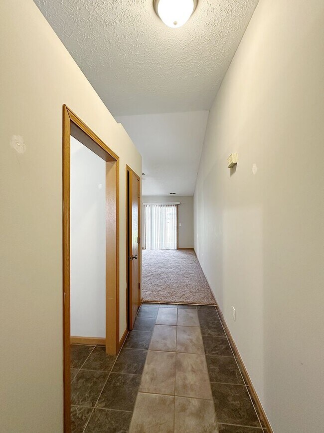 Building Photo - STUNNING Pond Views in this 2-Bed, 2-Bath Duplex