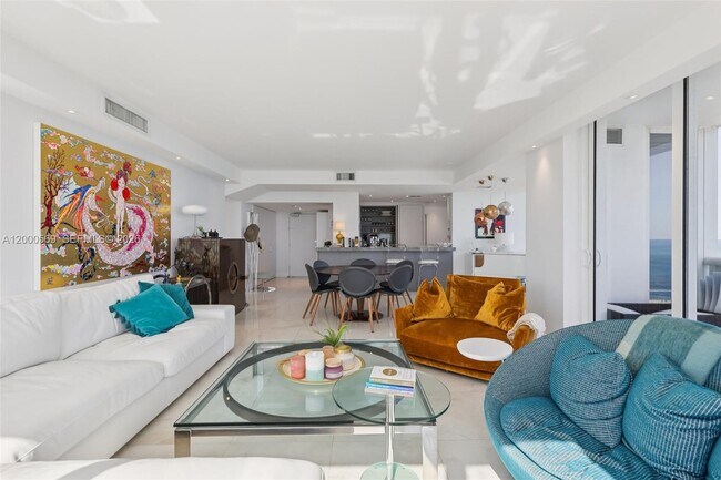 Building Photo - 10275 Collins Ave