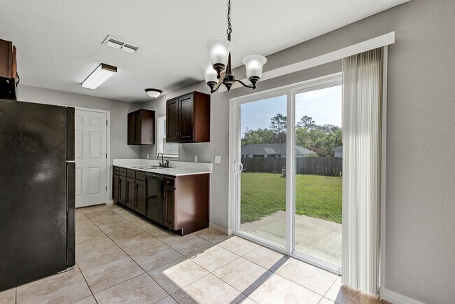 Building Photo - Freshly Painted 3BR Home with Spacious Yard, Modern Baths & No Deposit Option!