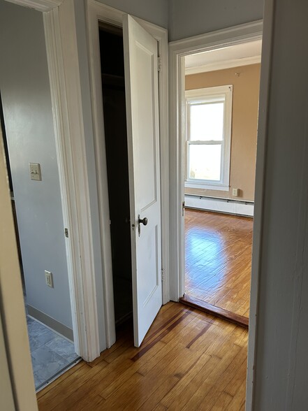 View from top of stairs. Bathroom to left master bedroom on right. Linen closet in middle - 36 Niles Rd