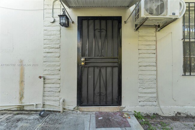 Building Photo - 6940 NW 6th Ct