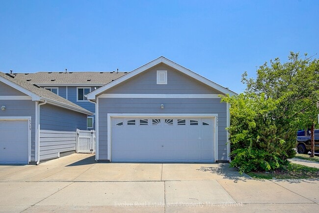 Building Photo - Evolve Real Estate: Beautiful Corner Townhome Available for Move-in on July 21st!