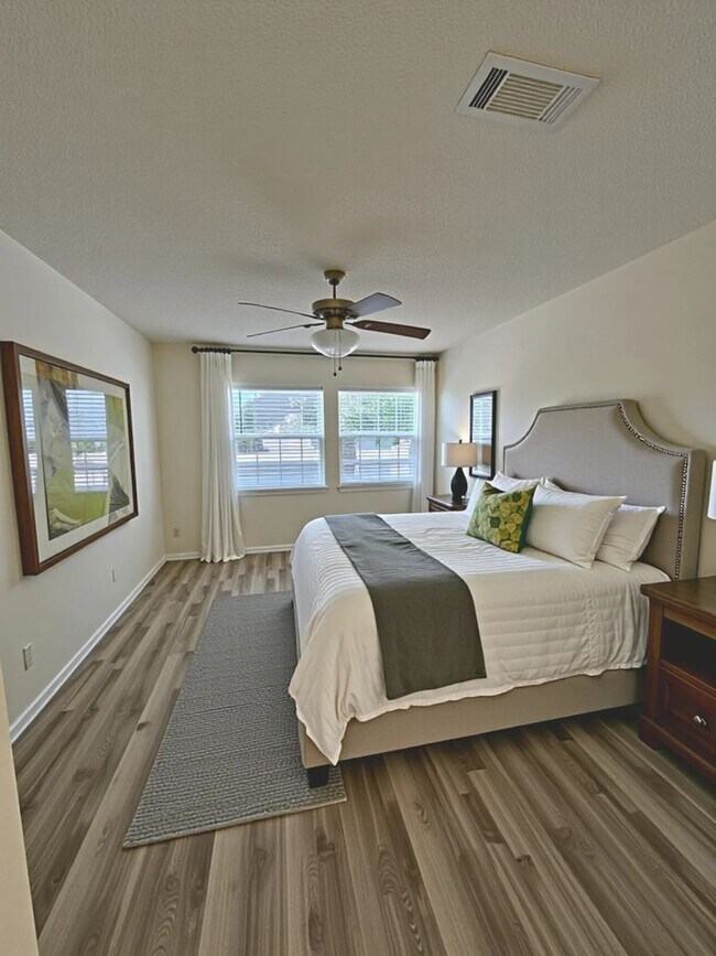 Building Photo - Beautifully Updated 2BR/2BA with Loft Oasis – Safe & Gated Community