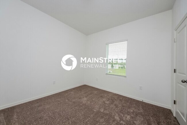 Building Photo - 4 Bedroom Pet-Friendly Home in Haines City, FL with Main Street Renewal